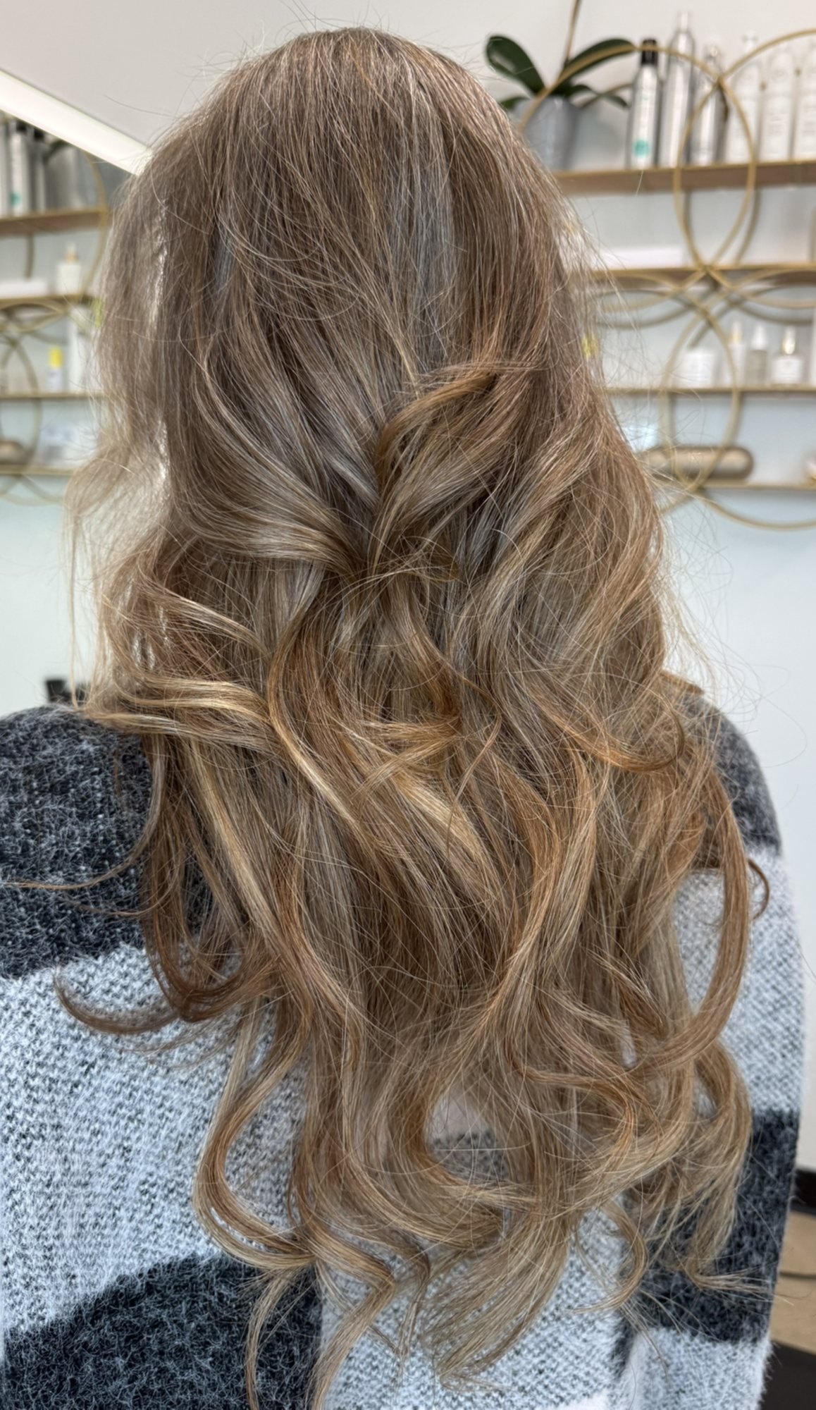 Long brunette waves with blonde highlights by Rachelle LaNae